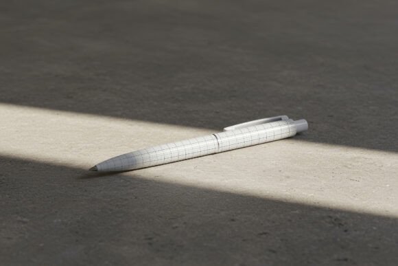 Download Elegant Pen on Concrete Floor Mockup - Mockup Collection